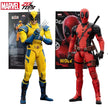 Two action figures, one yellow and blue, the other red and black, with their packaging in the background.