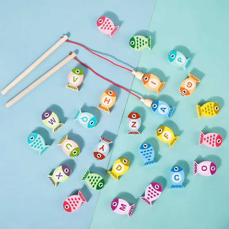 Colorful fishing game with letters on fish toys against a light blue background