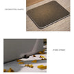 Textured mat with an interesting shape and a fixed strap on a wooden surface.