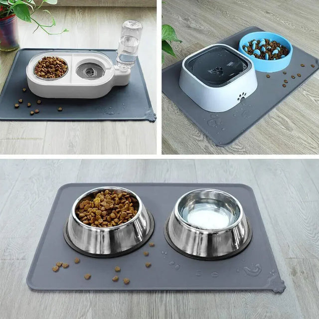 Pet feeding station with bowls and water dispenser on a mat.