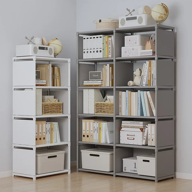 Two bookshelves with books, boxes, and decorative items against a plain wall.