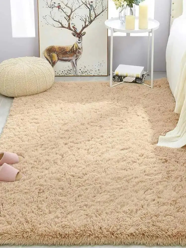 Beige shaggy rug in a living room setting with a deer painting on the wall.