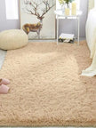 Beige shaggy rug in a living room setting with a deer painting on the wall.