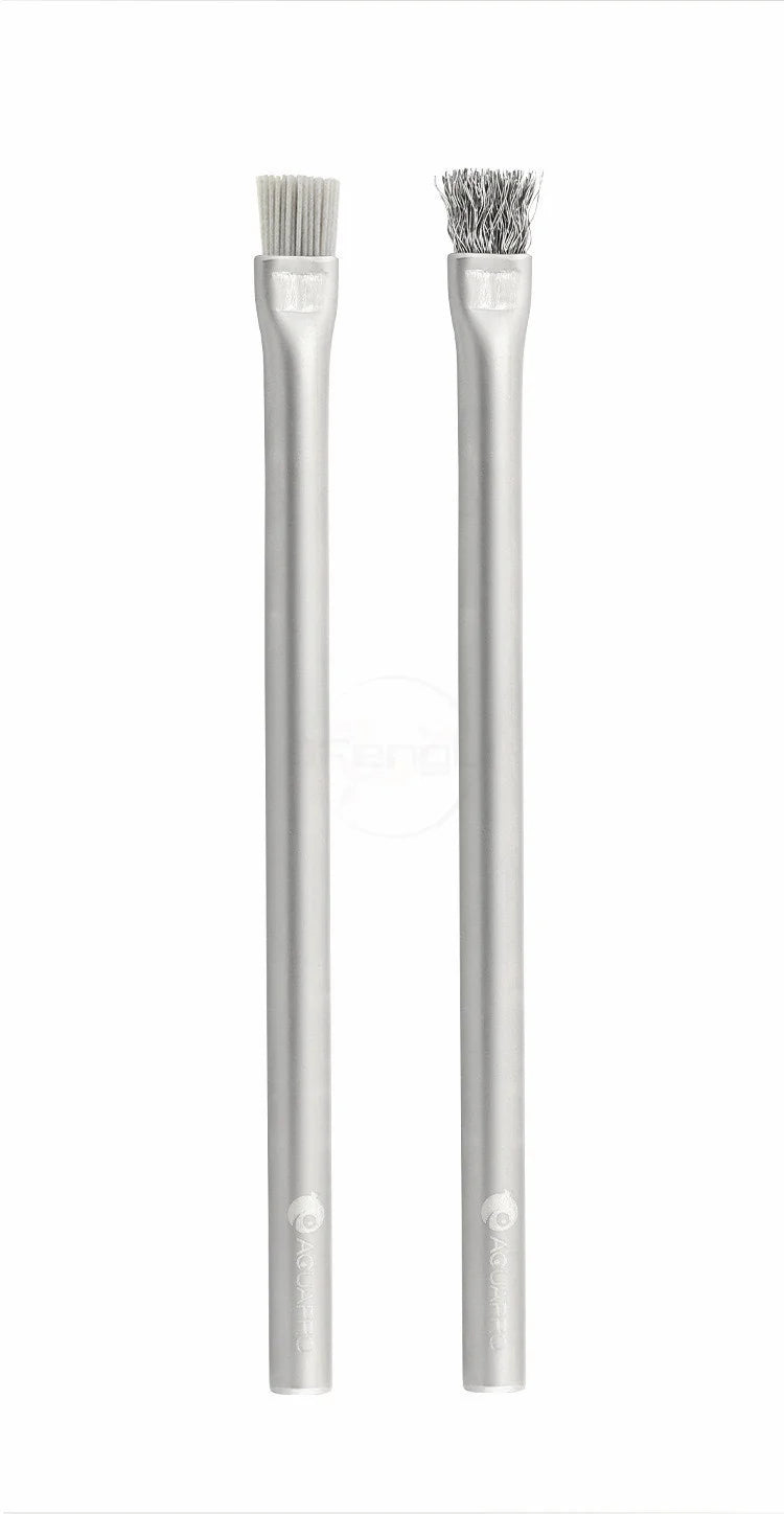 Two metal brushes with bristle ends on a white background
