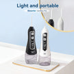 Two dental water flossers, one black and one white, on a light surface with a mirror in the background.