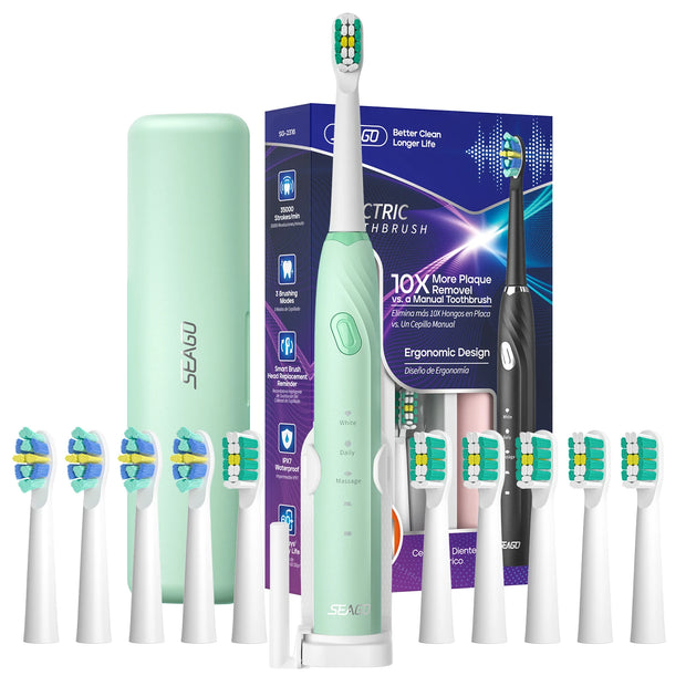Electric toothbrush set with multiple brush heads and packaging on a white background