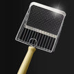 Metal grill basket with wooden handle on a black background