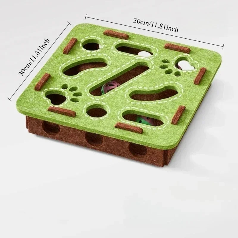 Green and brown puzzle toy with measurements on a white background