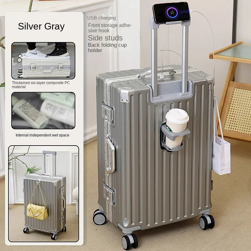 Silver gray suitcase with additional features and accessories on a neutral background