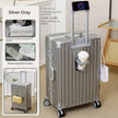 Silver gray suitcase with additional features and accessories on a neutral background