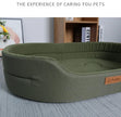 Green pet bed with 'Xiao ShenXian' branding on a neutral background