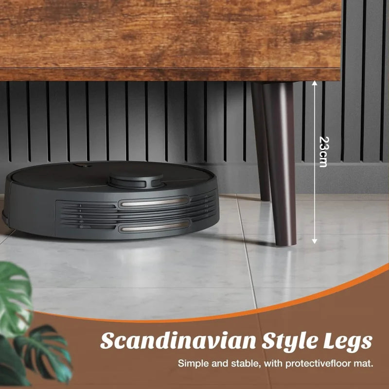 Robotic vacuum cleaner on a tiled floor with a wooden table and plant in the background, highlighting 'Scandinavian Style Legs' feature.