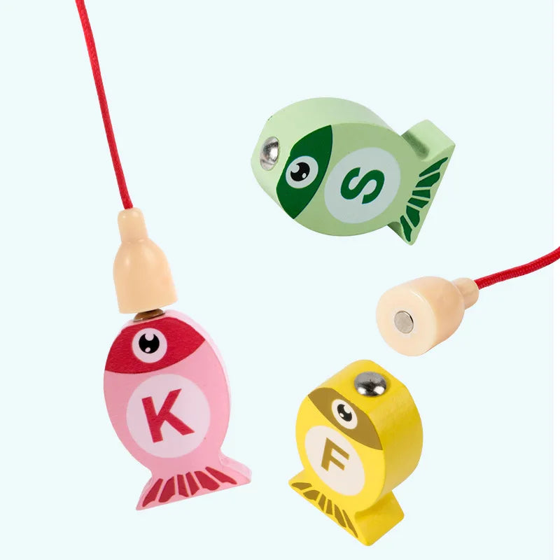 Colorful fishing toy with wooden fish and red string on a white background