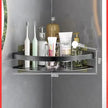 Bathroom shelf with toiletries against a gray wall
