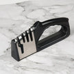 Knife sharpener on a marble surface