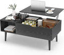 Black coffee table with lift-top design, displaying items including a laptop, camera, and books.