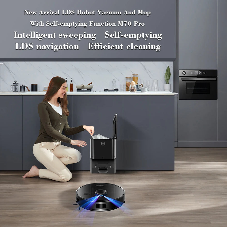 Woman using a robot vacuum and mop in a modern kitchen.