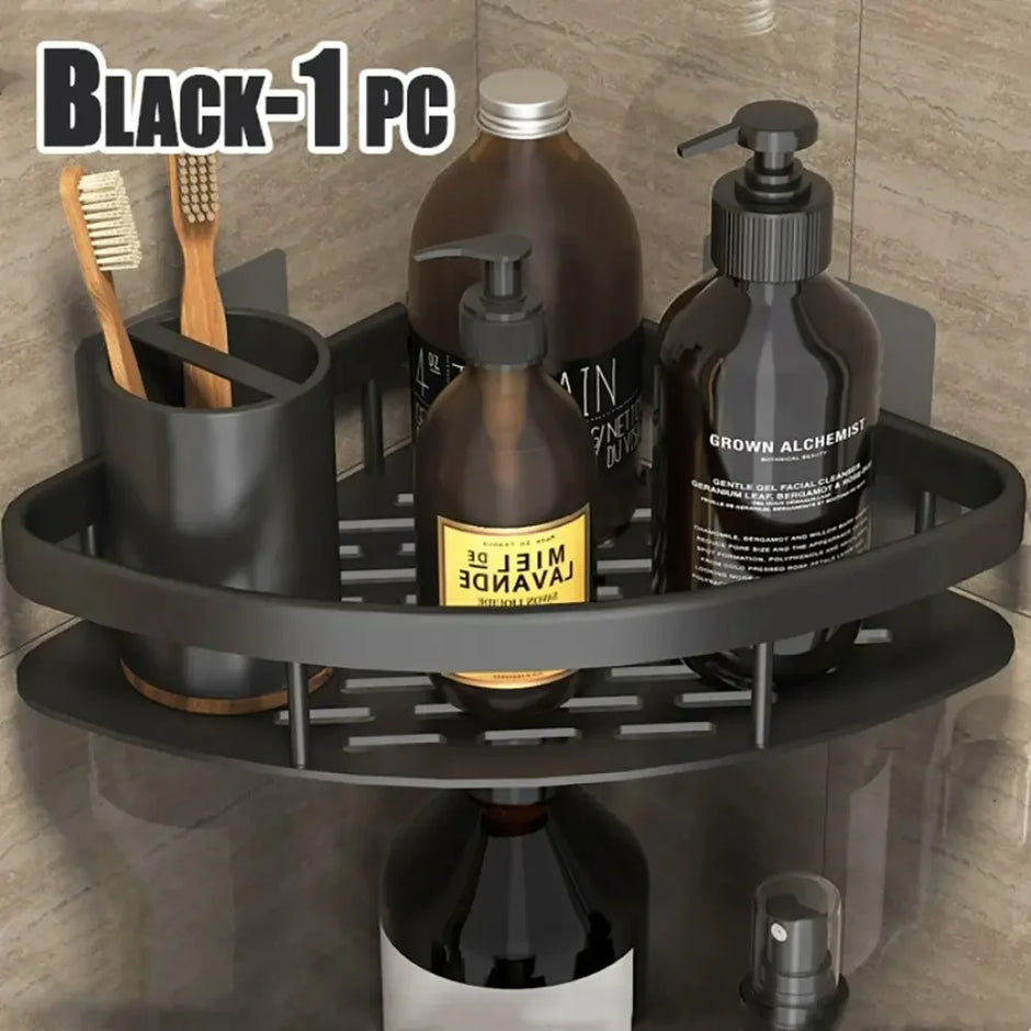 Black corner shower caddy with various bottles and a toothbrush holder on a tiled wall background.