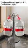 Two large water jugs with red lids on a metal stand, labeled 'Thickened Load-bearing Rod Easily Bears 10kg'.