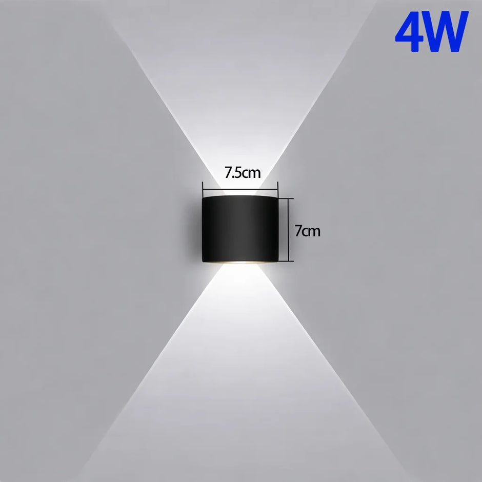 Black wall-mounted light fixture with dimensions and wattage label on a gray background