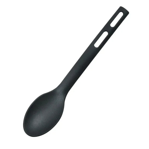Black spoon on a white background