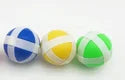 Three colorful balls with a pattern resembling a flag on a white background