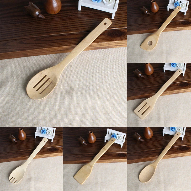 Wooden spoon with slotted design on a wooden surface and beige mat.
