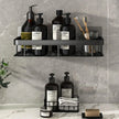 Bathroom shelf with various bottles and toiletries against a gray tiled wall.
