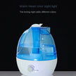 Humidifier with blue light on a black background