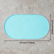 Blue rectangular mat with measurements on a beige surface