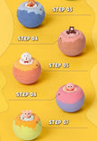 Animated sequence of colorful bath bombs with small animals on a yellow background