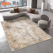 Modern living room with a patterned rug, sectional sofa, and cityscape view.