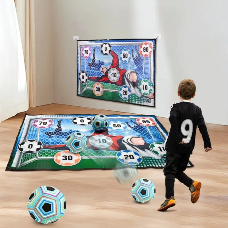 Child playing with a soccer-themed interactive mat on a wooden floor.