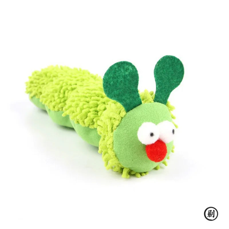 Green caterpillar-shaped plush toy with a red nose on a white background
