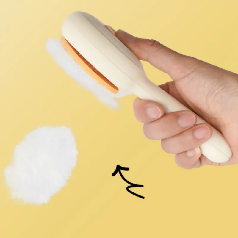Hand holding a white grooming brush with a yellow background