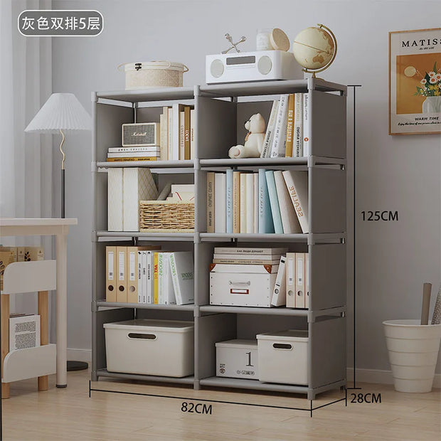 Gray bookshelf with books and decorative items in a room setting