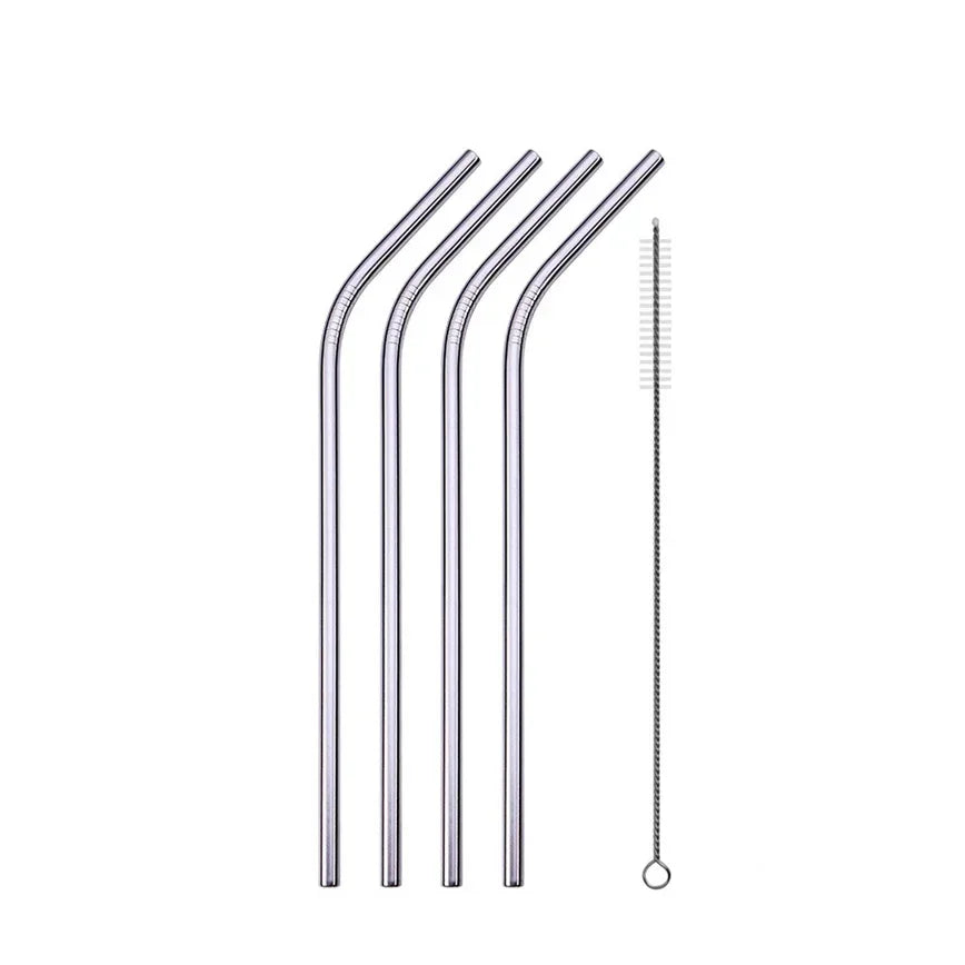Set of four metal straws with a cleaning brush on a white background