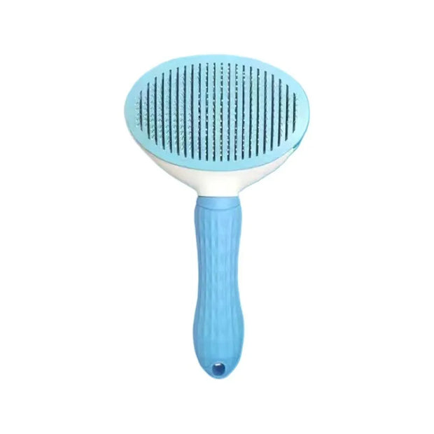 Blue pet grooming brush on a white background