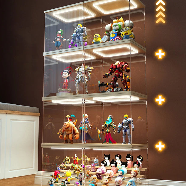 Clear glass display case with various action figures on a wooden floor.