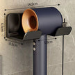 Hair dryer with measurements on a gray tiled wall