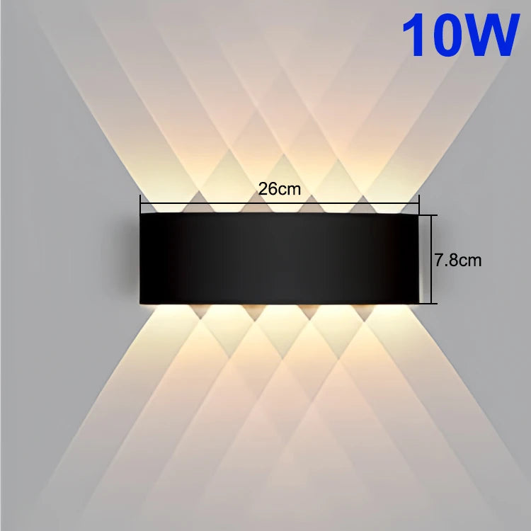 Wall-mounted light fixture with dimensions and power rating on a gray background
