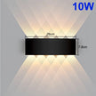 Wall-mounted light fixture with dimensions and power rating on a gray background