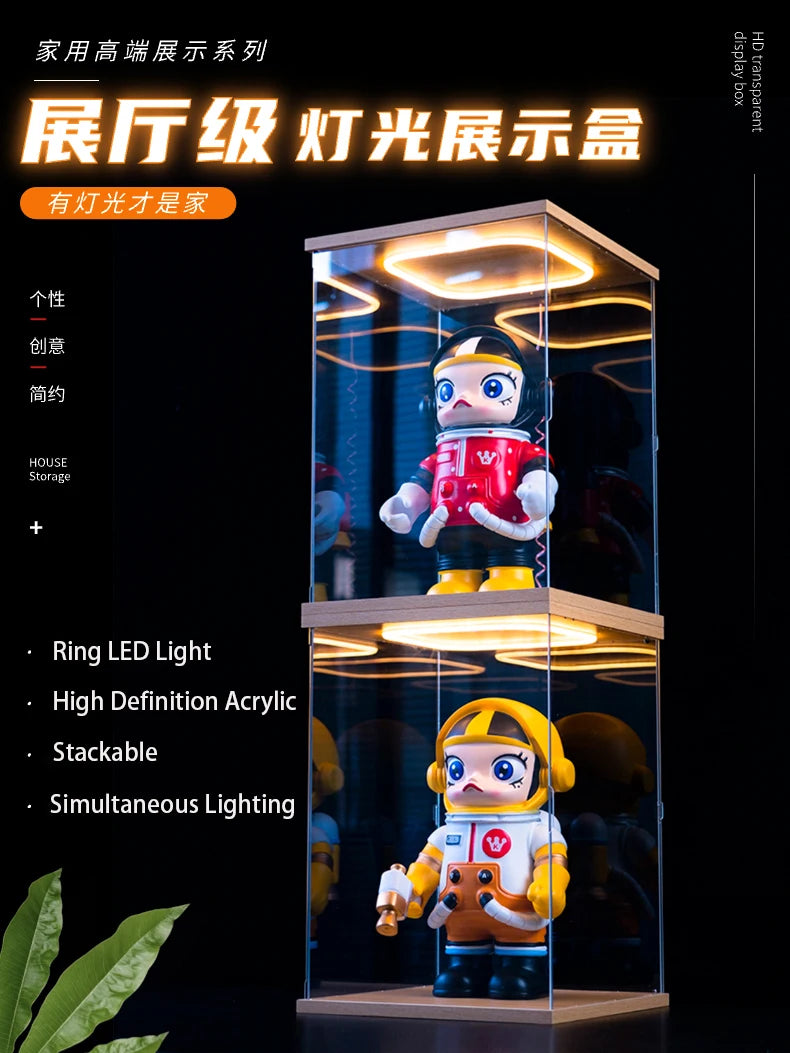 Toy figure in a transparent display case with LED lighting on a dark background
