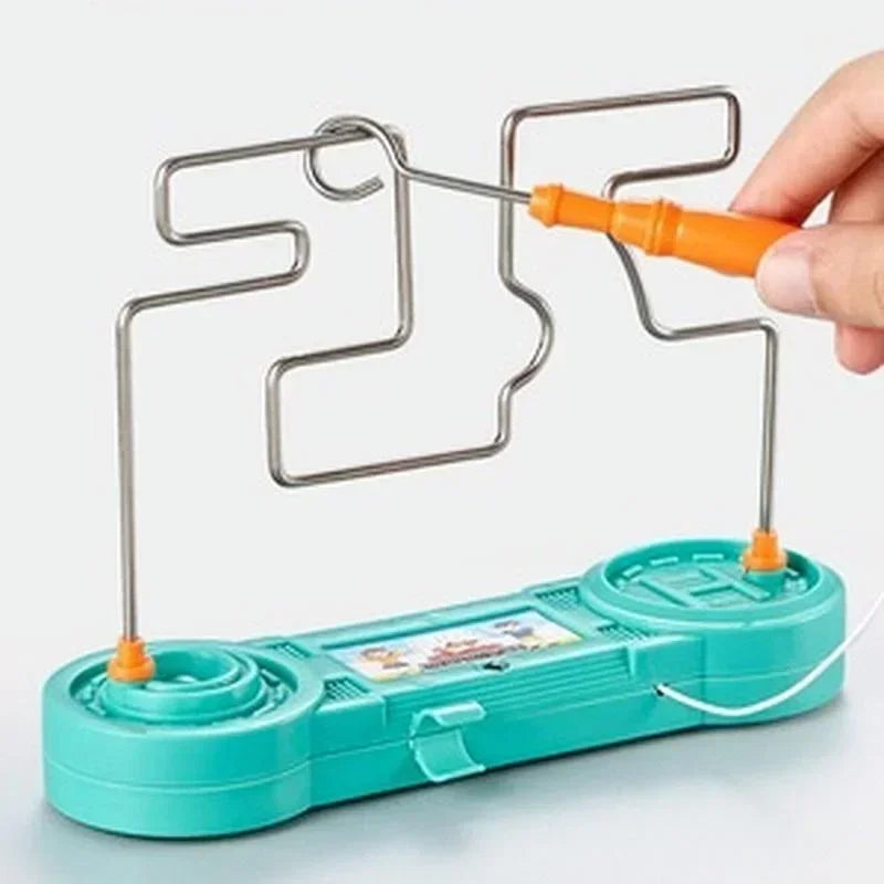 Teal toy with metal frame and orange handle on a white background