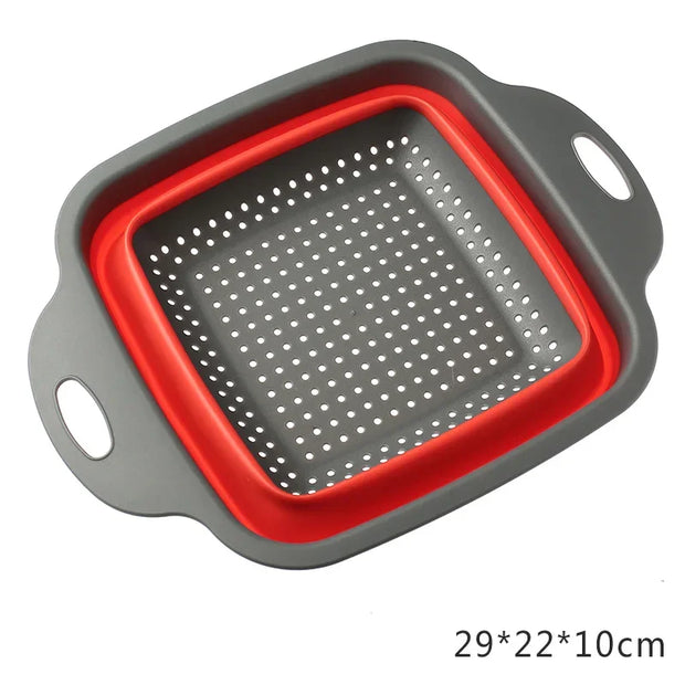 Collapsible colander with red interior and gray exterior on a white background