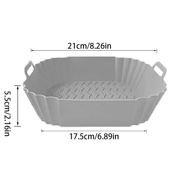 Gray metal pie dish with dimensions indicated on a white background