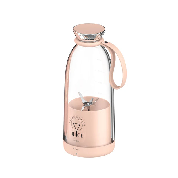 Rose gold and glass juicer on a white background