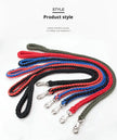 Set of braided leashes in red, blue, and black on a white background