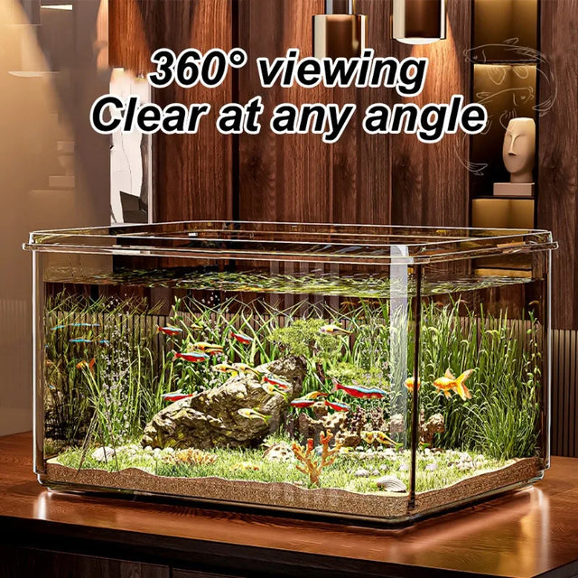 Glass aquarium with fish and plants on a wooden surface, text '360° viewing Clear at any angle' above.