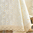 Beige fabric with white floral patterns and lace trim